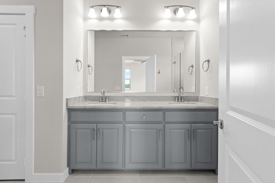Furnished interior view inside a new home in The Tribute, The Colony (Image 18).