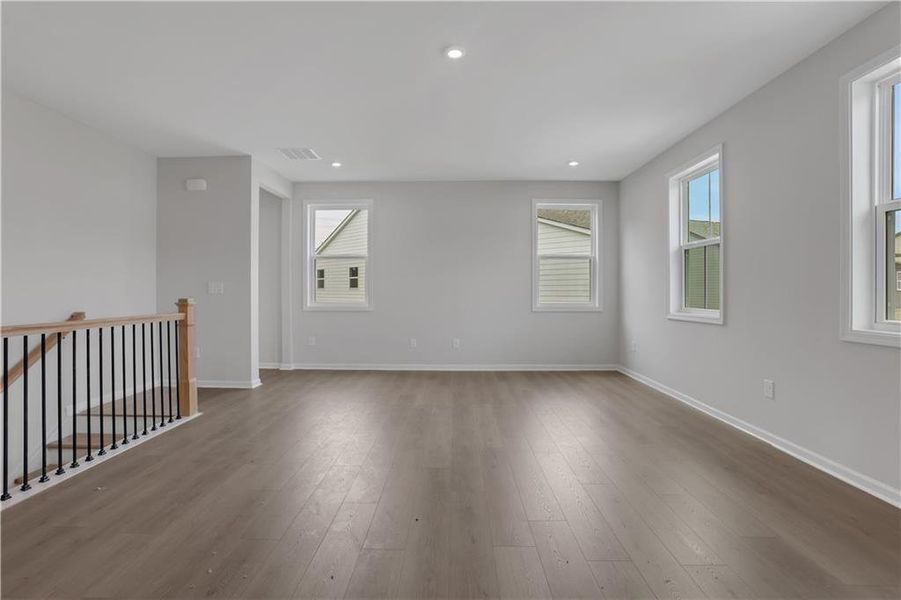Spacious, unfurnished interior of a new home in The Paddocks at Doc Hughes, Buford (Image 20).