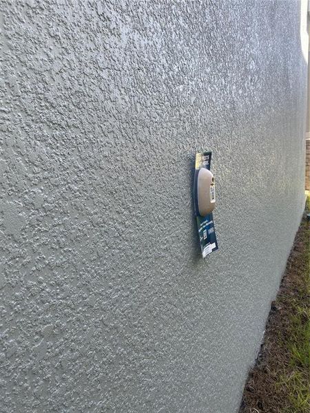 Exterior details and patio area of a home in Harmony Central, Harmony (Image 22). Exterior details and patio area of a home in Harmony Central, Harmony (Image 22).