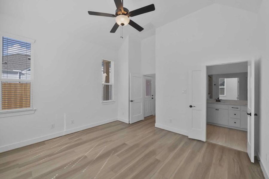 Representative unfurnished interior of a home built from the Versailles by Chesmar Homes in Meridiana Chateau, Manvel (Image 25).