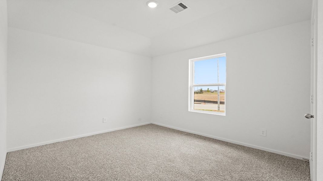 Spacious, unfurnished interior of a new home in Sunterra, Katy (Image 12).