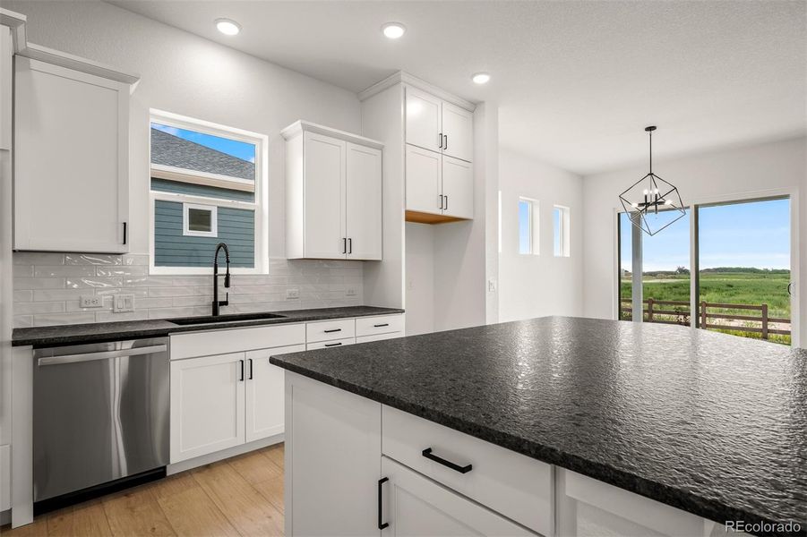 Furnished interior view inside a new home in Wolf Ranch - Enclave Collection, Colorado Springs (Image 13).