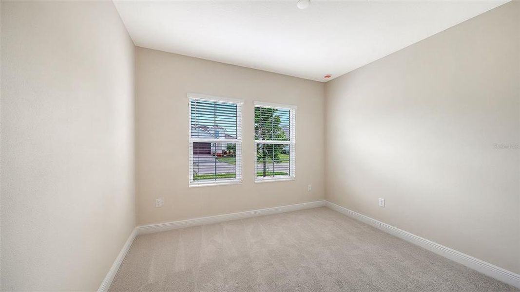 Spacious, unfurnished interior of a new home in Grand Park, Sarasota (Image 36).