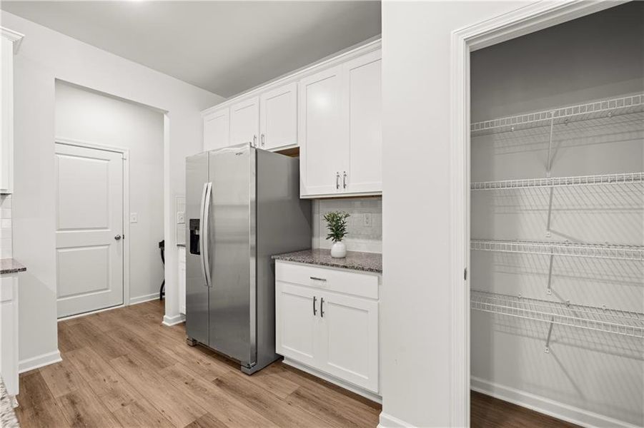 Furnished interior view inside a new home in The Retreat at Walden Park, Jonesboro (Image 29).