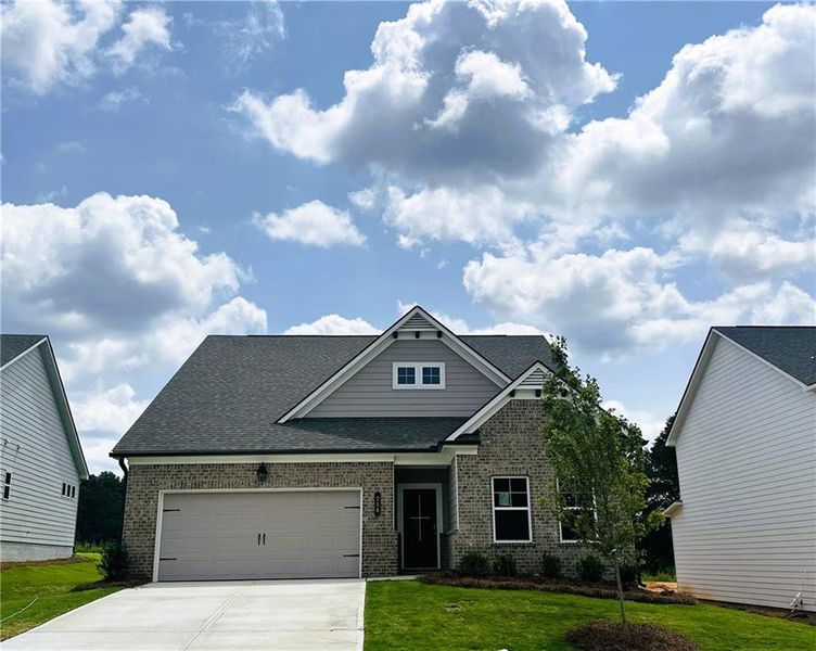 Front exterior of a new home in Summerlin, Winder, GA, highlighting curb appeal (Image 22).