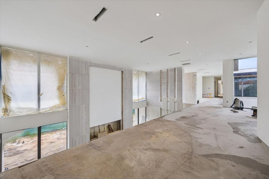 Expansive under construction Second floor open plan mezzanine gallery landing overlooks the living space below