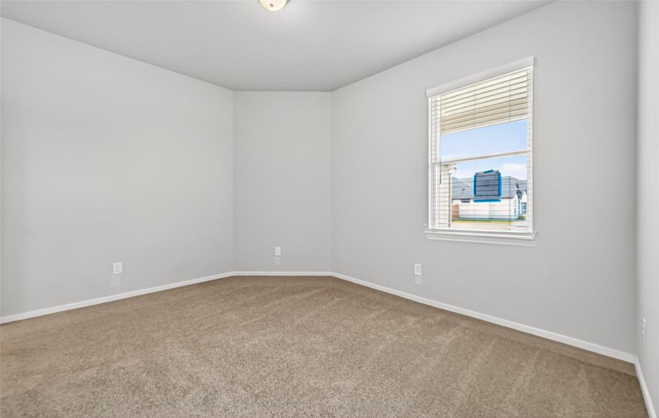 Spacious, unfurnished interior of a new home in Sunterra, Katy (Image 33).