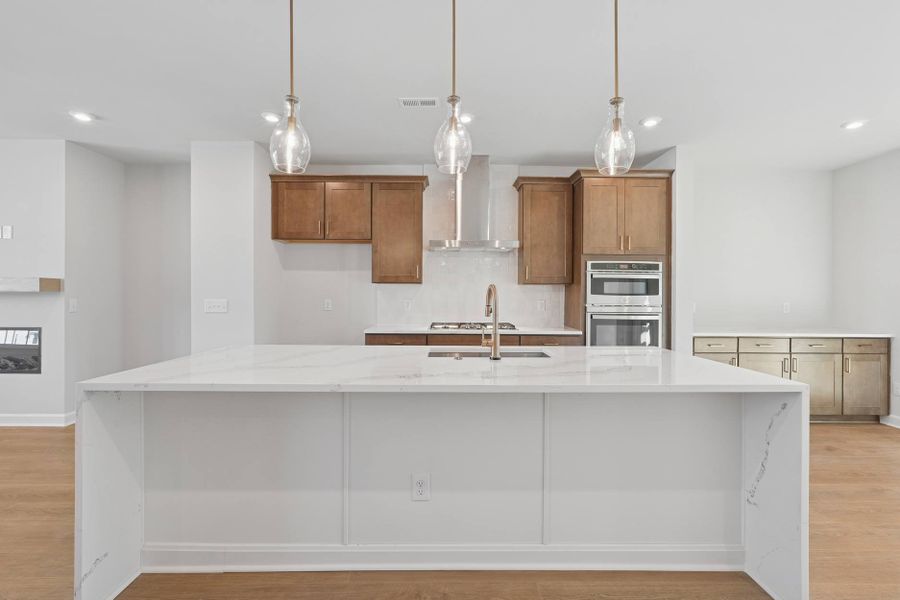 Representative furnished interior of a home built from the Kinston by Tri Pointe Homes in Elm Park, Raleigh (Image 5).