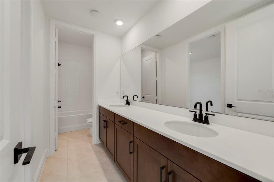 Furnished interior view inside a new home in Acuera Estates, Apopka (Image 5). Furnished interior view inside a new home in Acuera Estates, Apopka (Image 5).