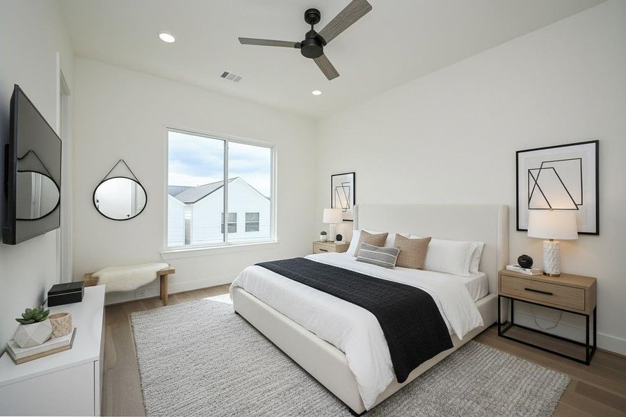 3rd bedroom upstairs with ensuite bathroom and closet. Virtually Staged.