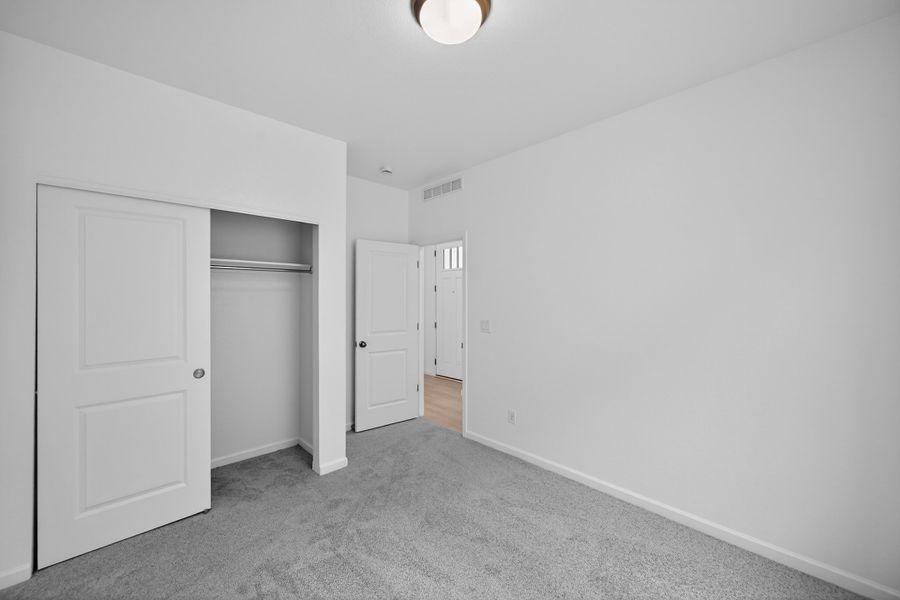 Spacious, unfurnished interior of a new home in Trailstone, Arvada (Image 21).