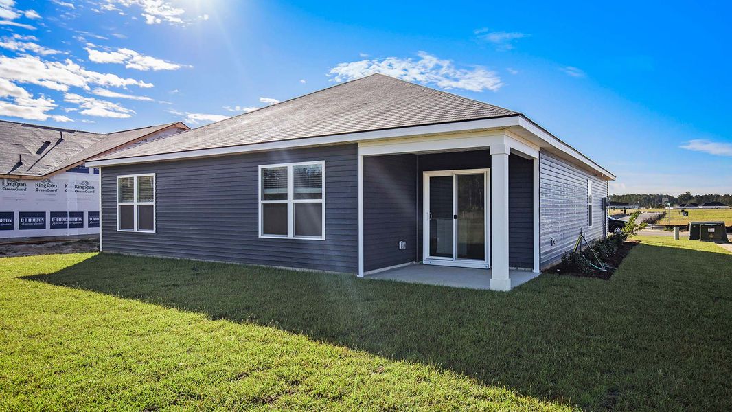Exterior details and patio area of a home in Sandridge Park, Little River (Image 3).