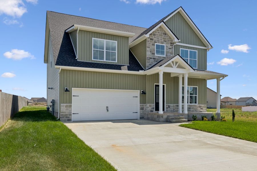 Front exterior of a new home in Summerfield, Clarksville, TN, highlighting curb appeal (Image 19). Front exterior of a new home in Summerfield, Clarksville, TN, highlighting curb appeal (Image 19).