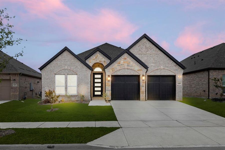 Front exterior of a new home in Edgewood Creek, Celina, TX, highlighting curb appeal (Image 1). Front exterior of a new home in Edgewood Creek, Celina, TX, highlighting curb appeal (Image 1).