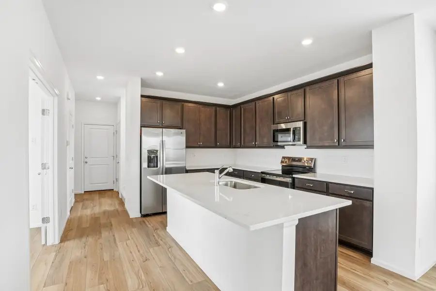 Furnished interior view inside a new home in Windler, Aurora (Image 4).