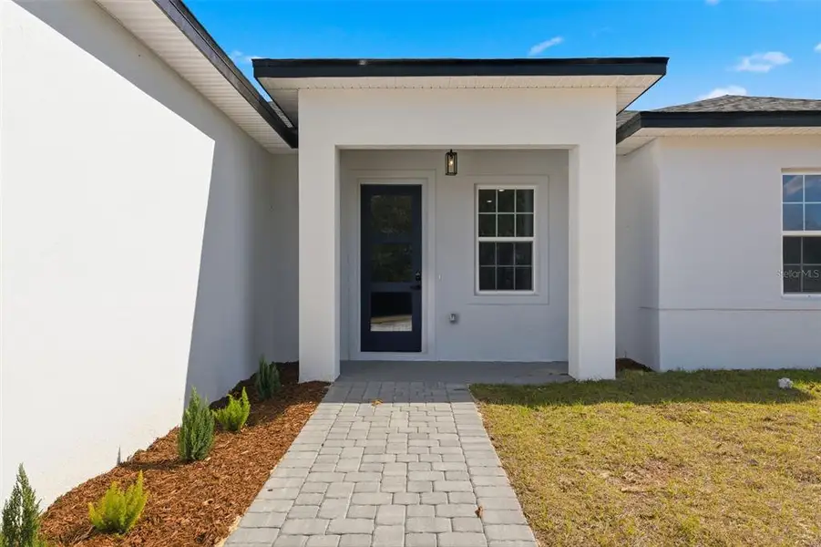 Exterior details and patio area of a home in , Ocala (Image 3).