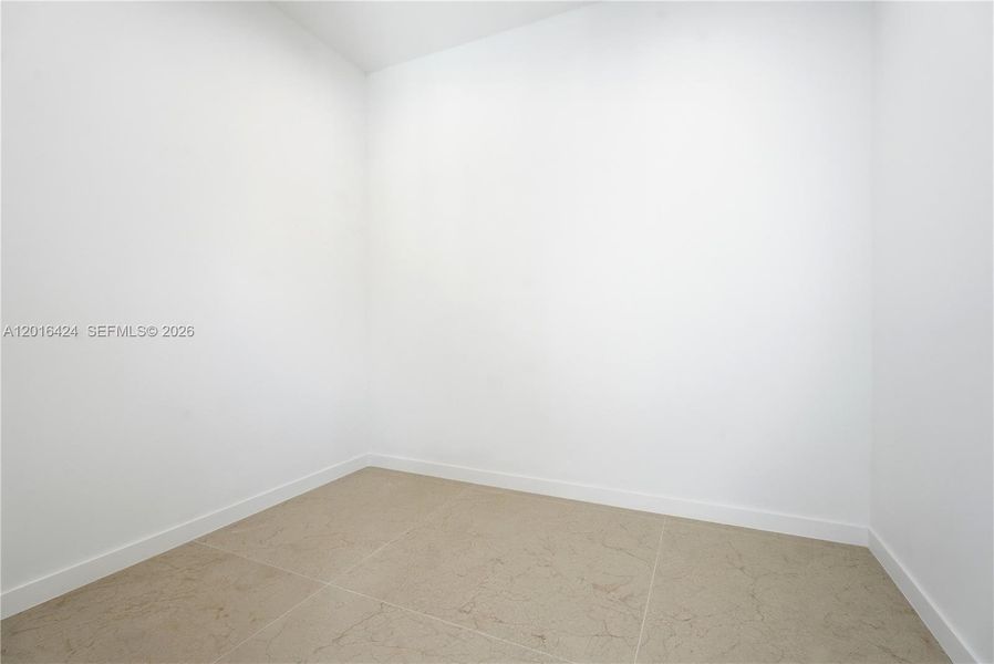 One of two Primary Walk-in Closets