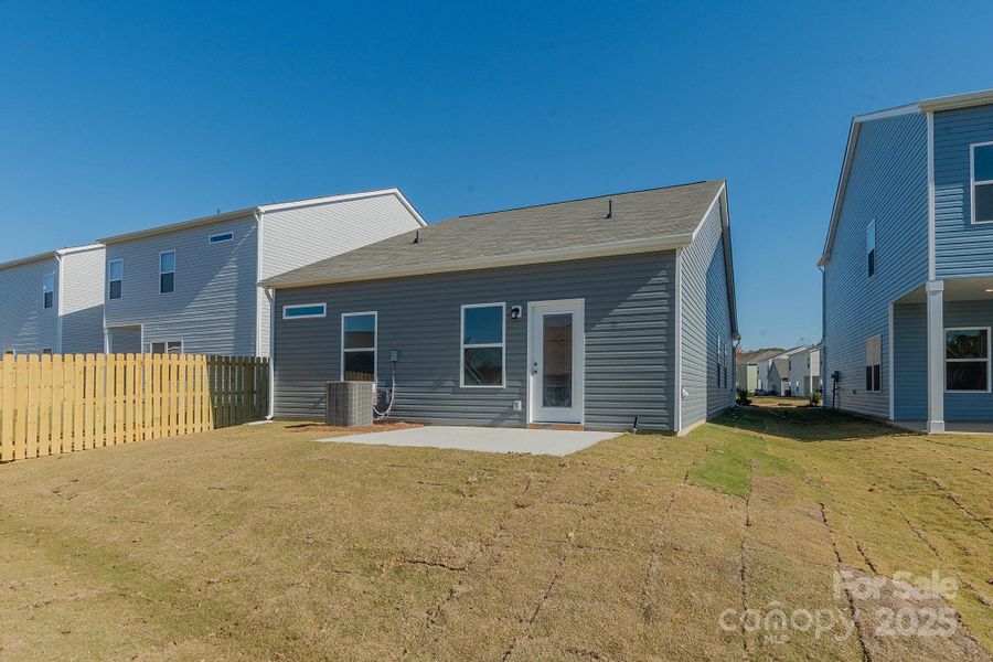 Exterior details and patio area of a home in Country Club Village, Salisbury (Image 3). Exterior details and patio area of a home in Country Club Village, Salisbury (Image 3).