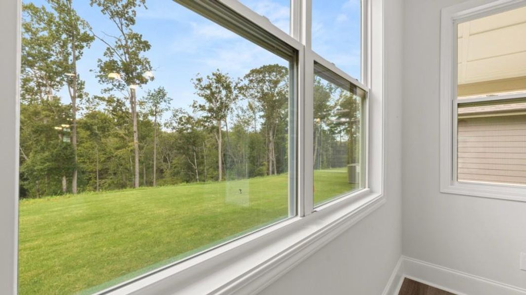 Exterior details and patio area of a home in Hamptons at Riverwood North, Dallas (Image 22).