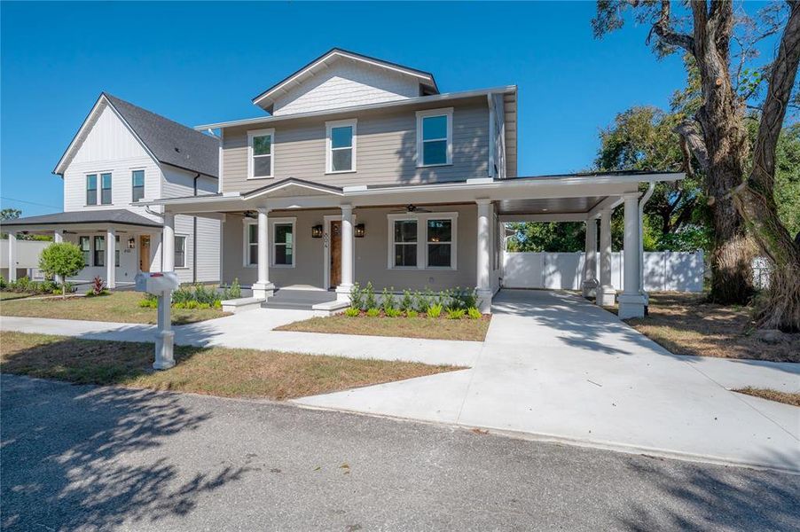 Front exterior of a new home in , Tampa, FL, highlighting curb appeal (Image 26).
