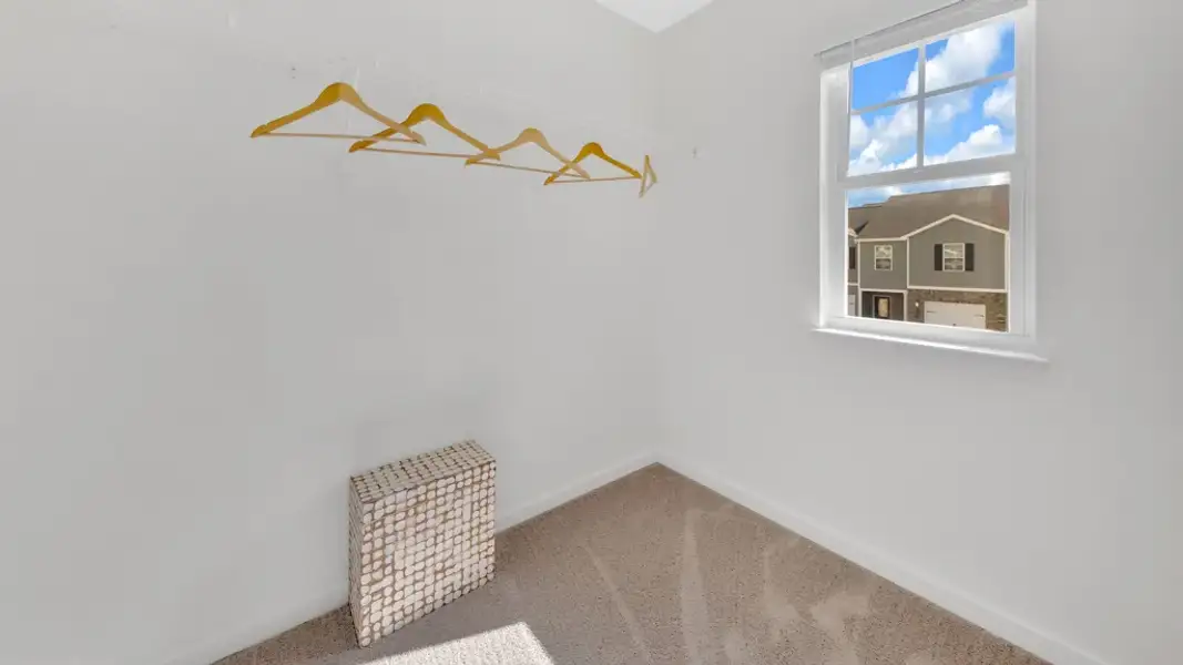 Representative unfurnished interior of a home built from the Altamont Townhome by D.R. Horton in Smoky Hollow, Sevierville (Image 19).