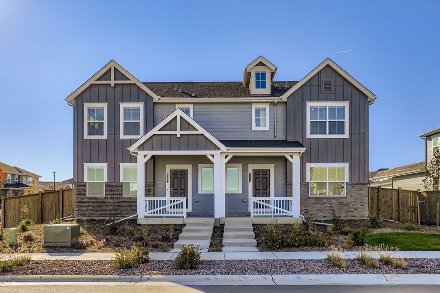Front exterior of a new home in Eastcreek Farm: Paired Homes, Thornton, CO, highlighting curb appeal (Image 1). Front exterior of a new home in Eastcreek Farm: Paired Homes, Thornton, CO, highlighting curb appeal (Image 1).
