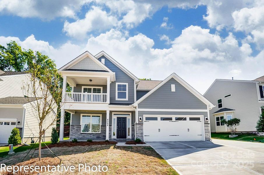 Homesite 73 features a Cypress H floorplan with second floor balcony and front load garage.