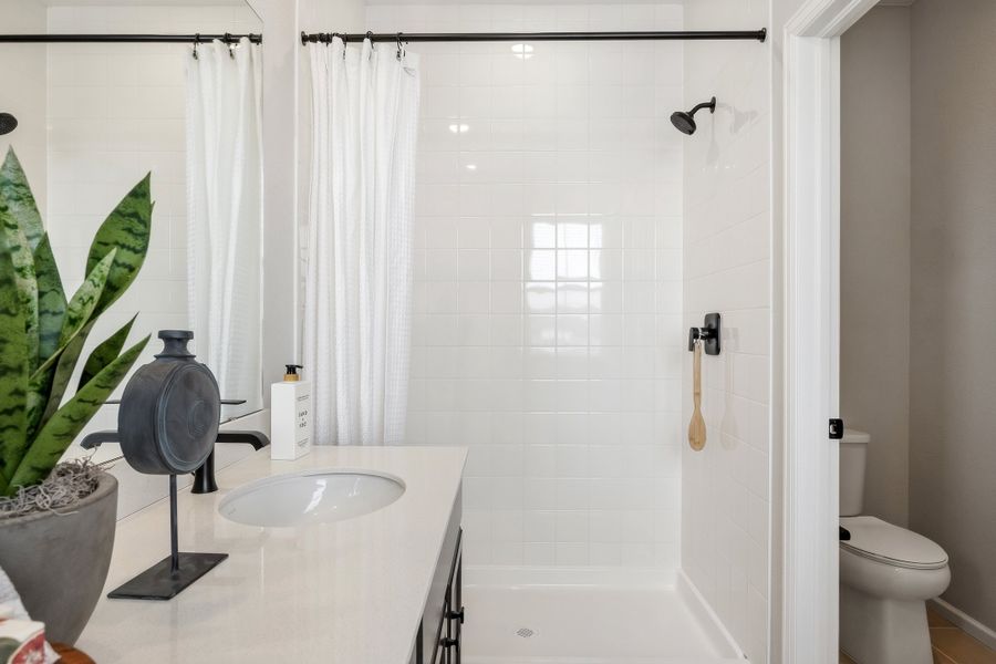 Representative furnished interior of a home built from the 2503 by Risewell Homes in Harvest Crossing, Aurora (Image 18).