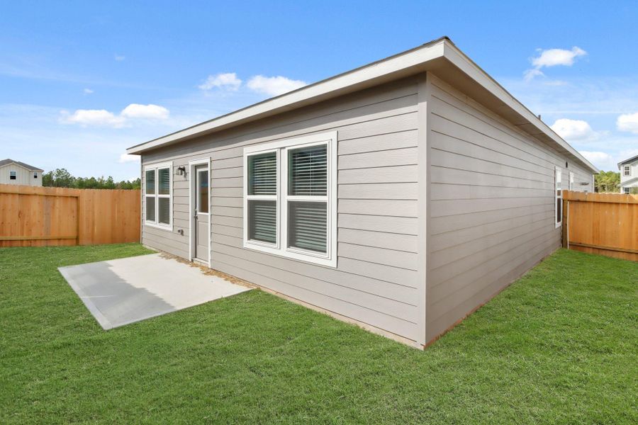 Exterior details and patio area of a home in Northpark South, Porter (Image 4). Exterior details and patio area of a home in Northpark South, Porter (Image 4).