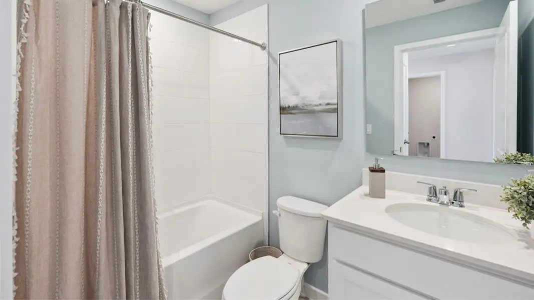 Furnished interior view inside a new home in Fish Lake Cove, Kissimmee (Image 12).