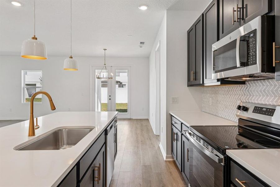 Furnished interior view inside a new home in Sunbrooke, St. Cloud (Image 8). Furnished interior view inside a new home in Sunbrooke, St. Cloud (Image 8).