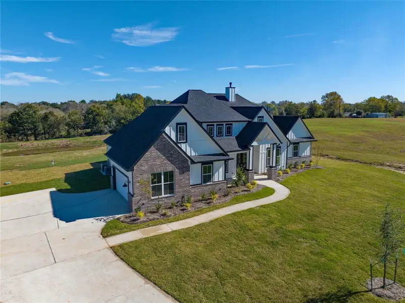 Charming home with  backyard pond views.
