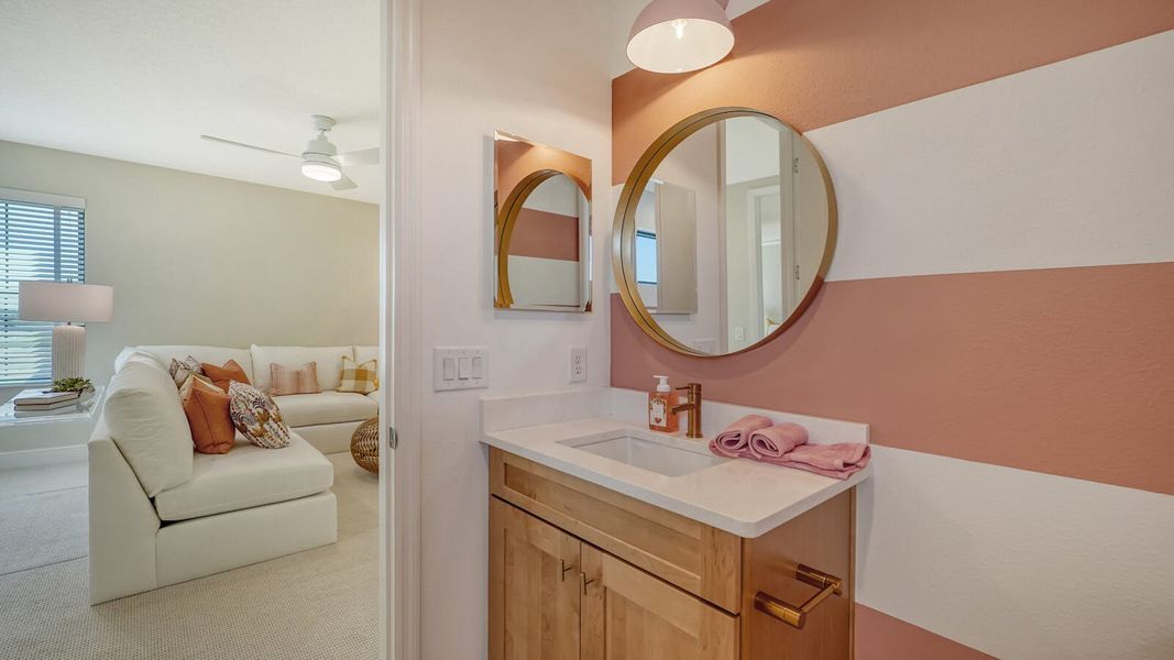 Furnished interior view inside a new home in SkySail Real Estate and Homes for Sale in Naples, FL - Neal Communities, Naples (Image 6).
