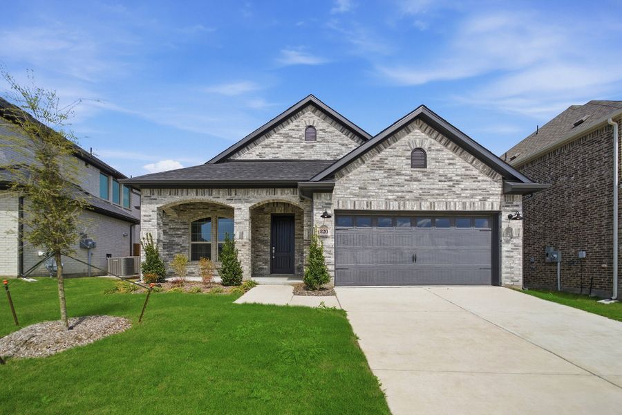 Front exterior of a new home in Westridge, McKinney, TX, highlighting curb appeal (Image 1). Front exterior of a new home in Westridge, McKinney, TX, highlighting curb appeal (Image 1).