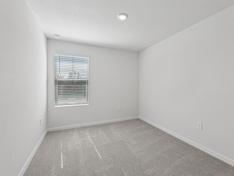 Spacious, unfurnished interior of a new home in Cagan Crossings West, Clermont (Image 11).