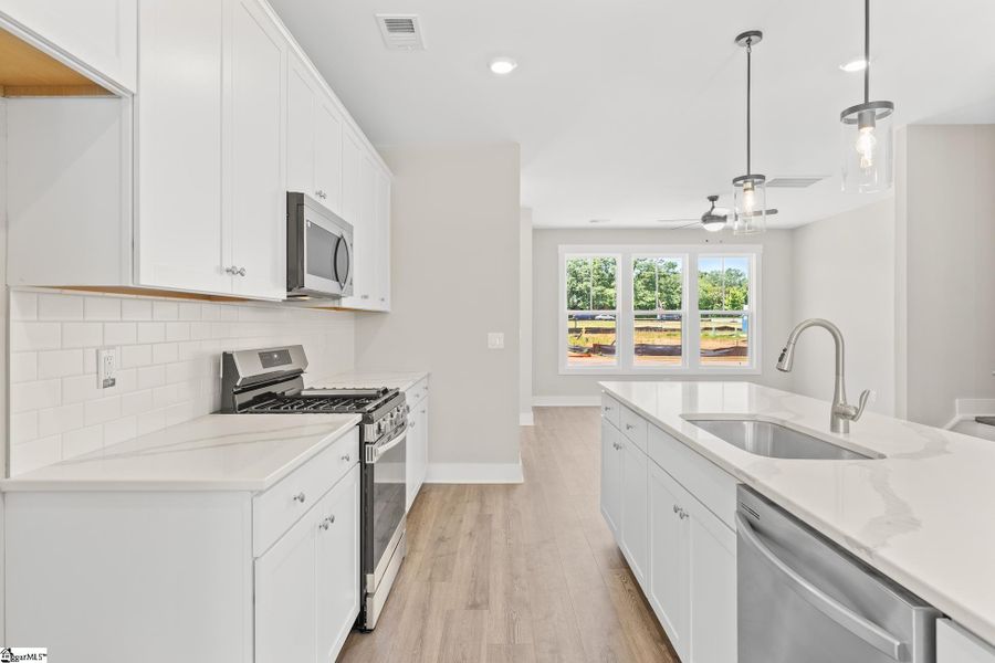 Furnished interior view inside a new home in Renaissance Place, Greenville (Image 8).