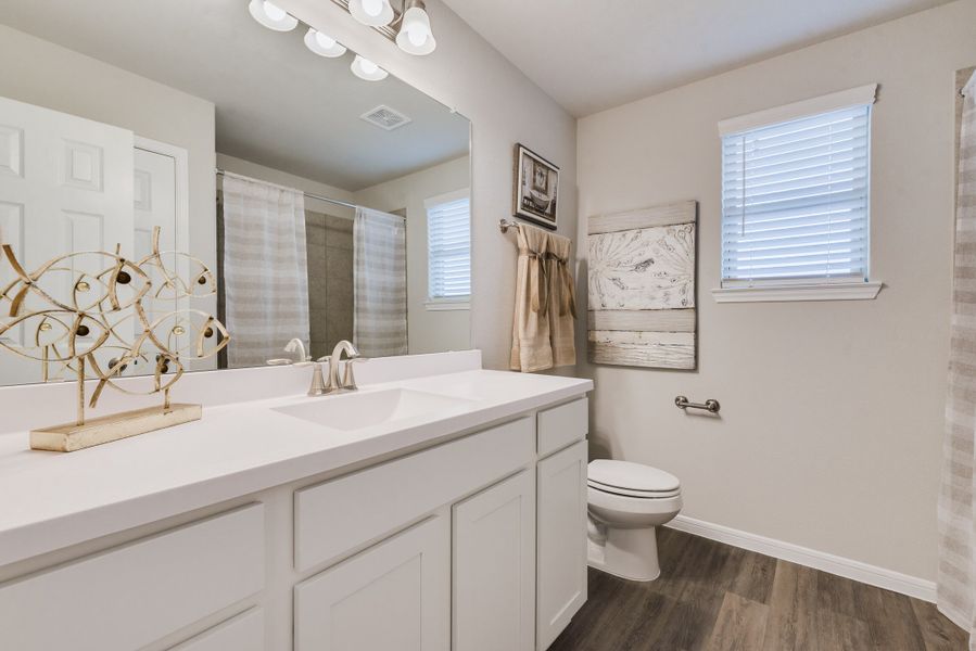 Representative furnished interior of a home built from the Floor Plan 2102 by Colina Homes in Sunterra, Katy (Image 12). Representative furnished interior of a home built from the Floor Plan 2102 by Colina Homes in Sunterra, Katy (Image 12).