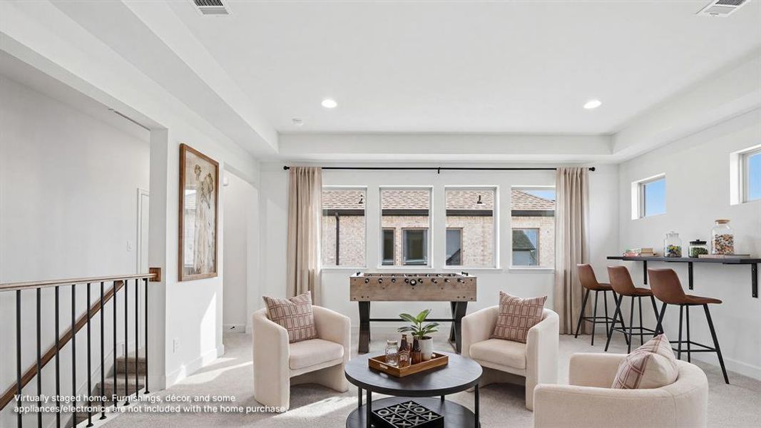 Furnished interior view inside a new home in The Heights at Uptown Celina, Celina (Image 9).