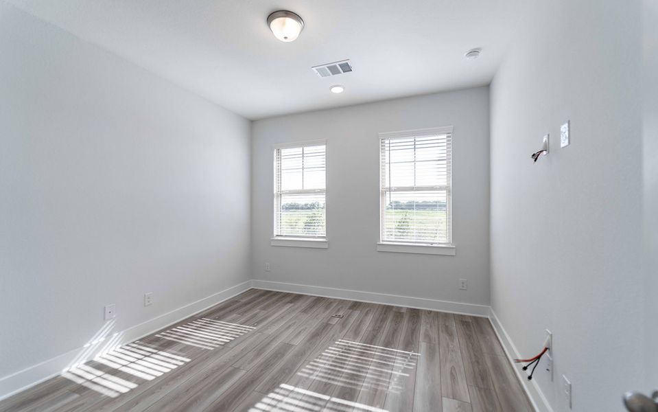 Spacious, unfurnished interior of a new home in Solterra, Mesquite (Image 18).