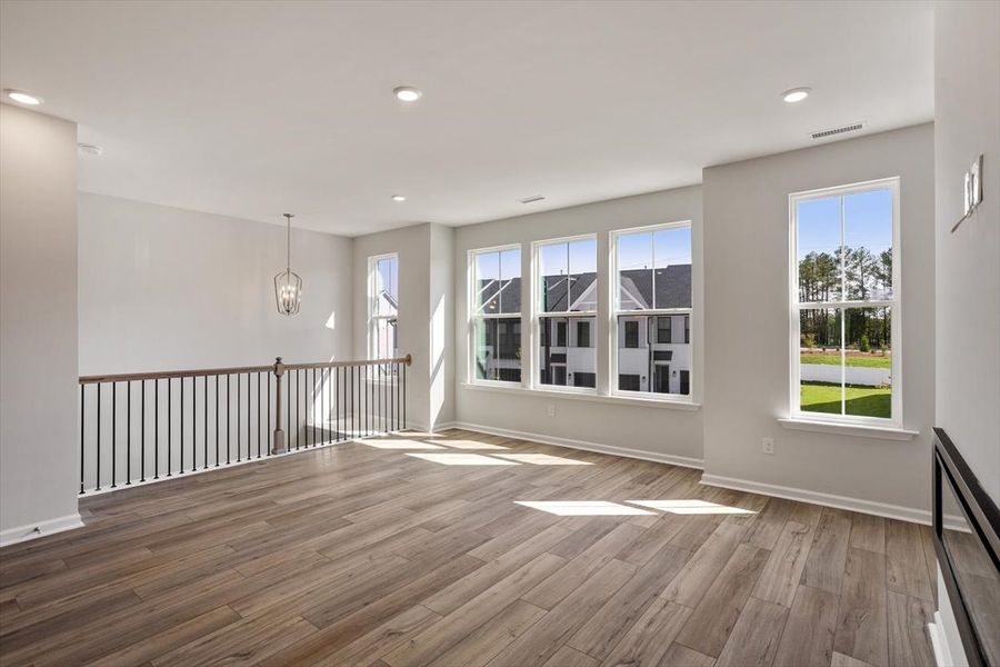 Spacious, unfurnished interior of a new home in Sweetbrier, Durham (Image 20).