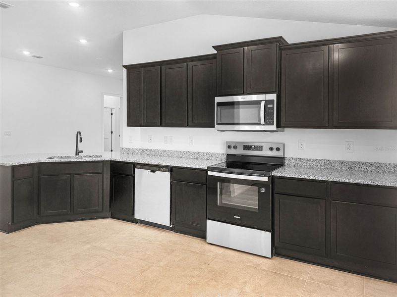 Furnished interior view inside a new home in Harmony Central, St. Cloud (Image 7).