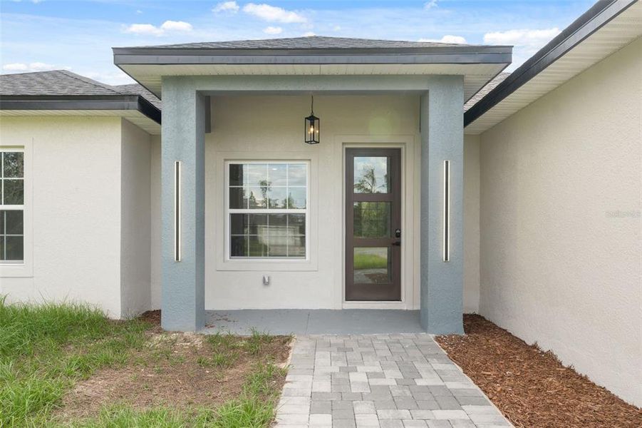 Front exterior of a new home in , Ocala, FL, highlighting curb appeal (Image 16).