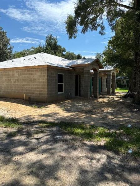 Front exterior of a new home in , Williston, FL, highlighting curb appeal (Image 2).