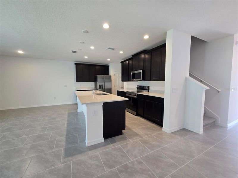 Furnished interior view inside a new home in Sky Lakes Estates, St. Cloud (Image 8).