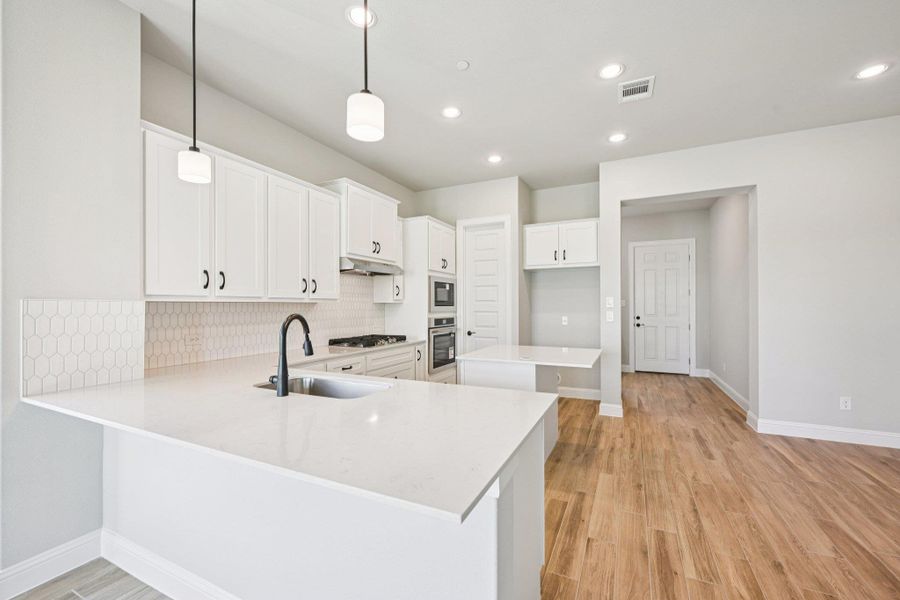 Furnished interior view inside a new home in Cross Creek, Cedar Park (Image 11).