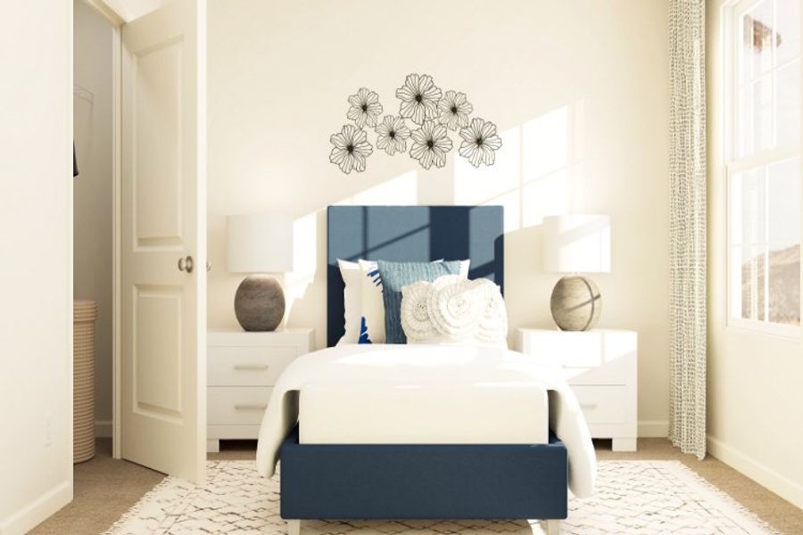 A bedroom with a white bed and a white wallpaper.