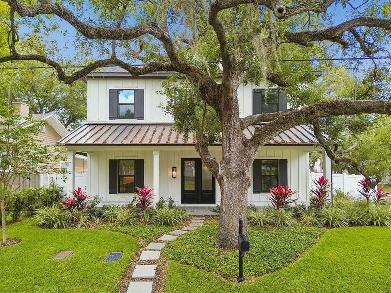 Front exterior of a new home in , Tampa, FL, highlighting curb appeal (Image 27).