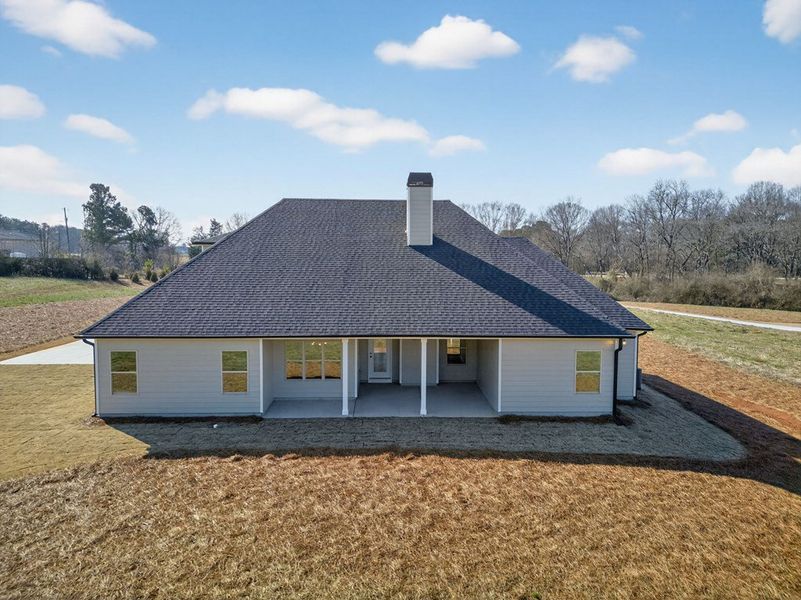 Exterior details and patio area of a home in Blackwelder Bluff, Bowdon (Image 28).