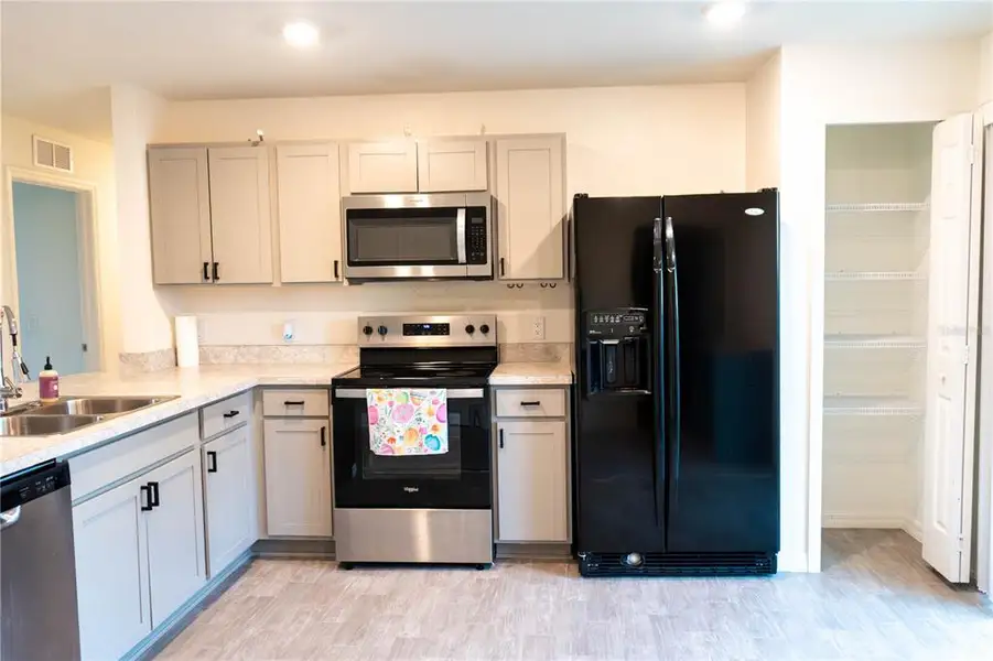 Furnished interior view inside a new home in , Port Charlotte (Image 5).