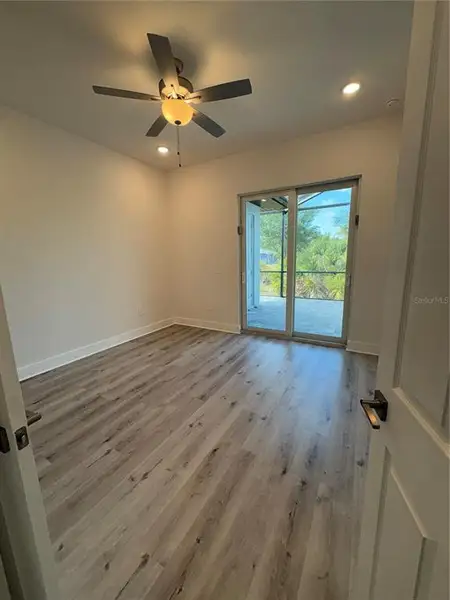Spacious, unfurnished interior of a new home in , Port Charlotte (Image 16).
